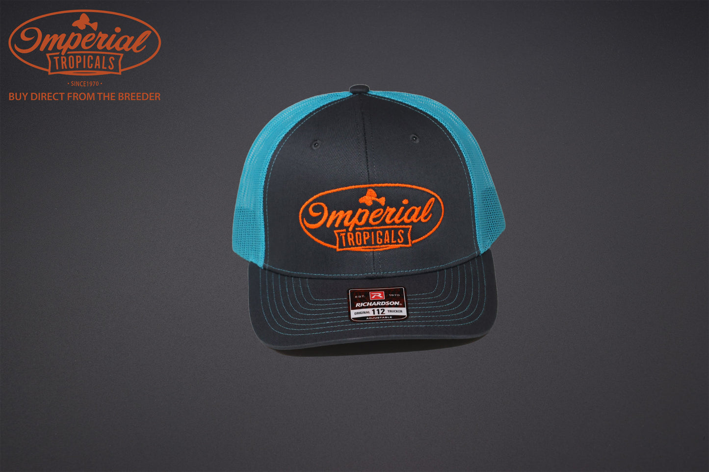 Gray with Turquoise Mesh and Orange Logo Imperial Tropicals Snapback Hat